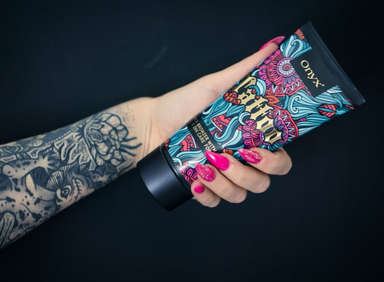 Dark tan and tattoo protection?