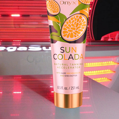 Onyx Suncolada tanning lotion in front of red light tanning bed, ideal for indoor use with vegan ingredients, aloe, and bronzer-free formula for even tanning