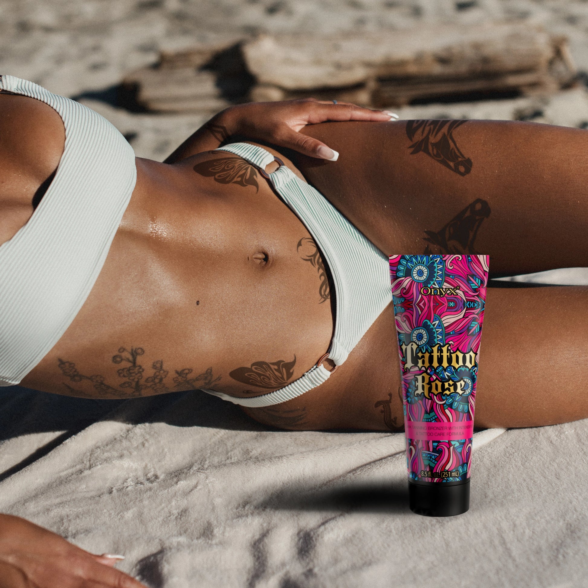 Onyx Tattoo Rose bronzing lotion for radiant tan and even skin tone, suitable for indoor and outdoor tanning beds