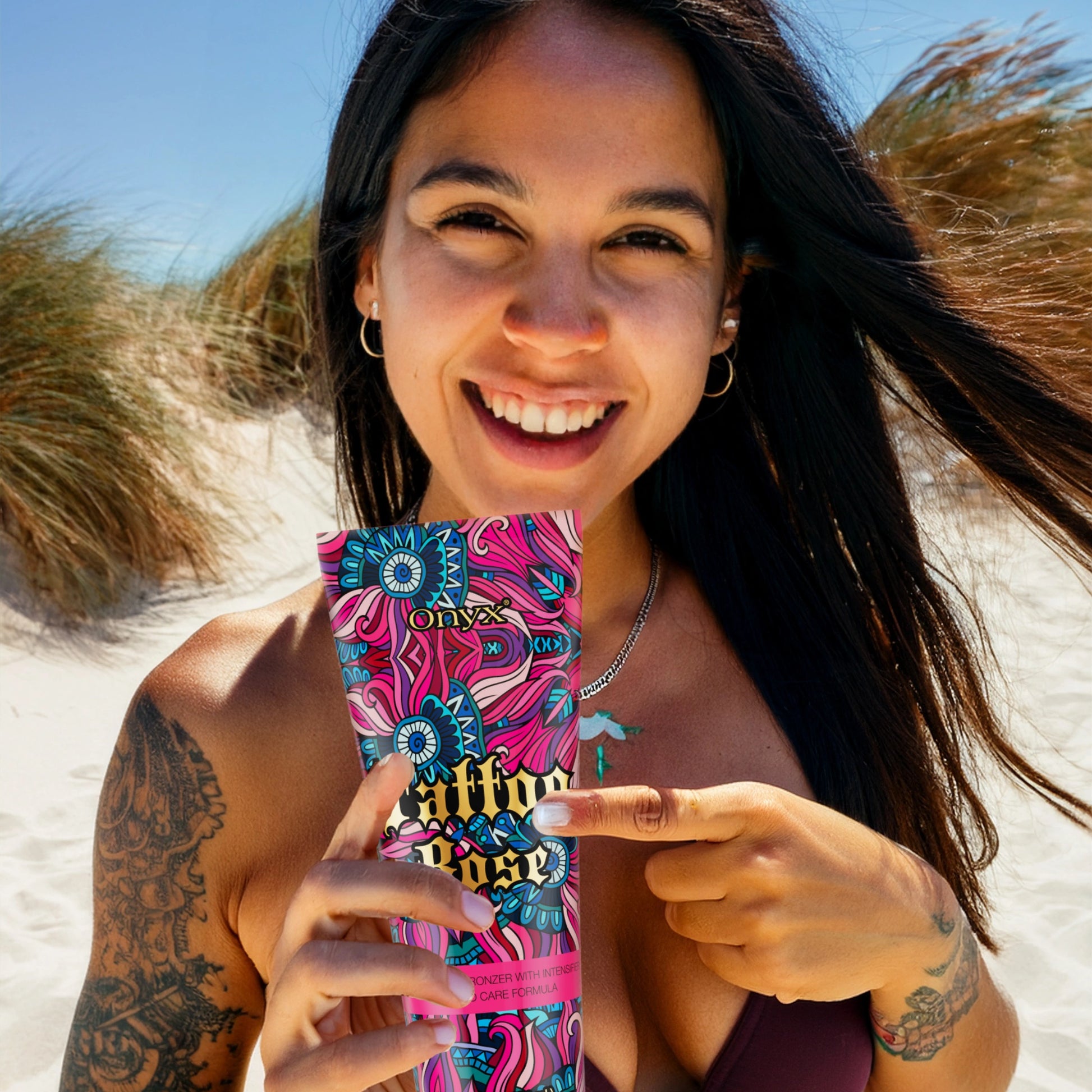 Onyx Tattoo Rose bronzing lotion for radiant tan and even skin tone, suitable for indoor and outdoor tanning beds